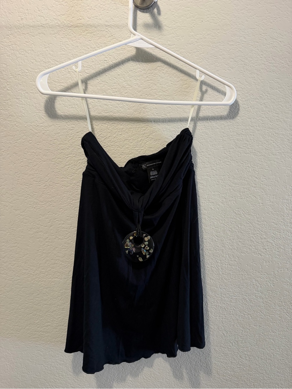 Black Strapless Shirt with Decorative Pendant